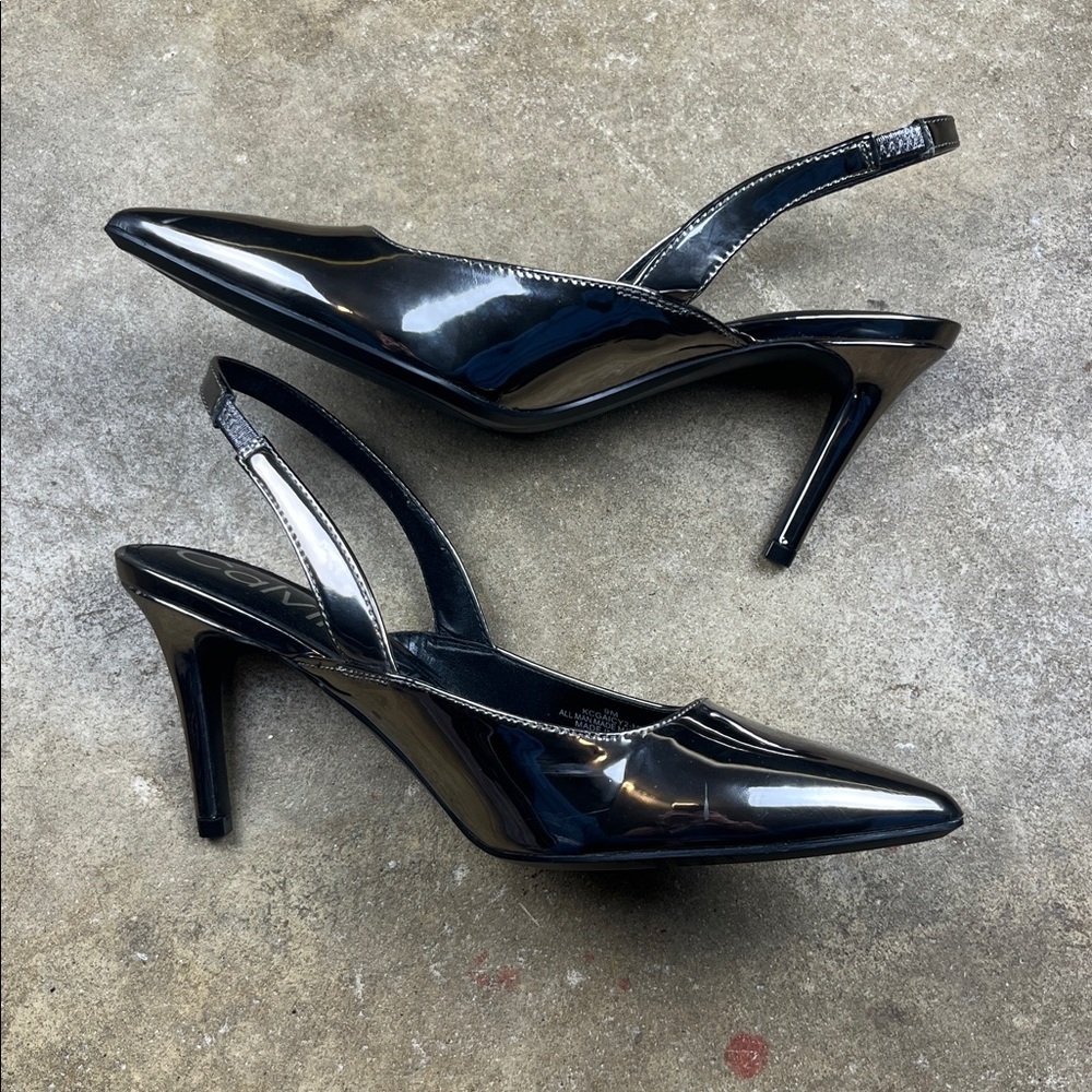 Calvin Klein Metallic Slingback Heels
Size: 9 - Picture 2 of 7
